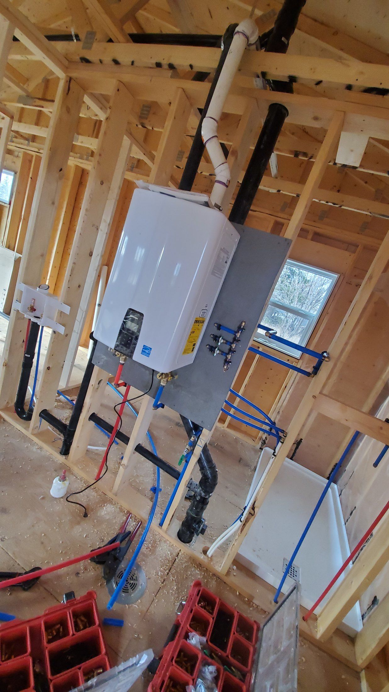 Tank vs tankless water heater comparison for Calgary homes by DNB
