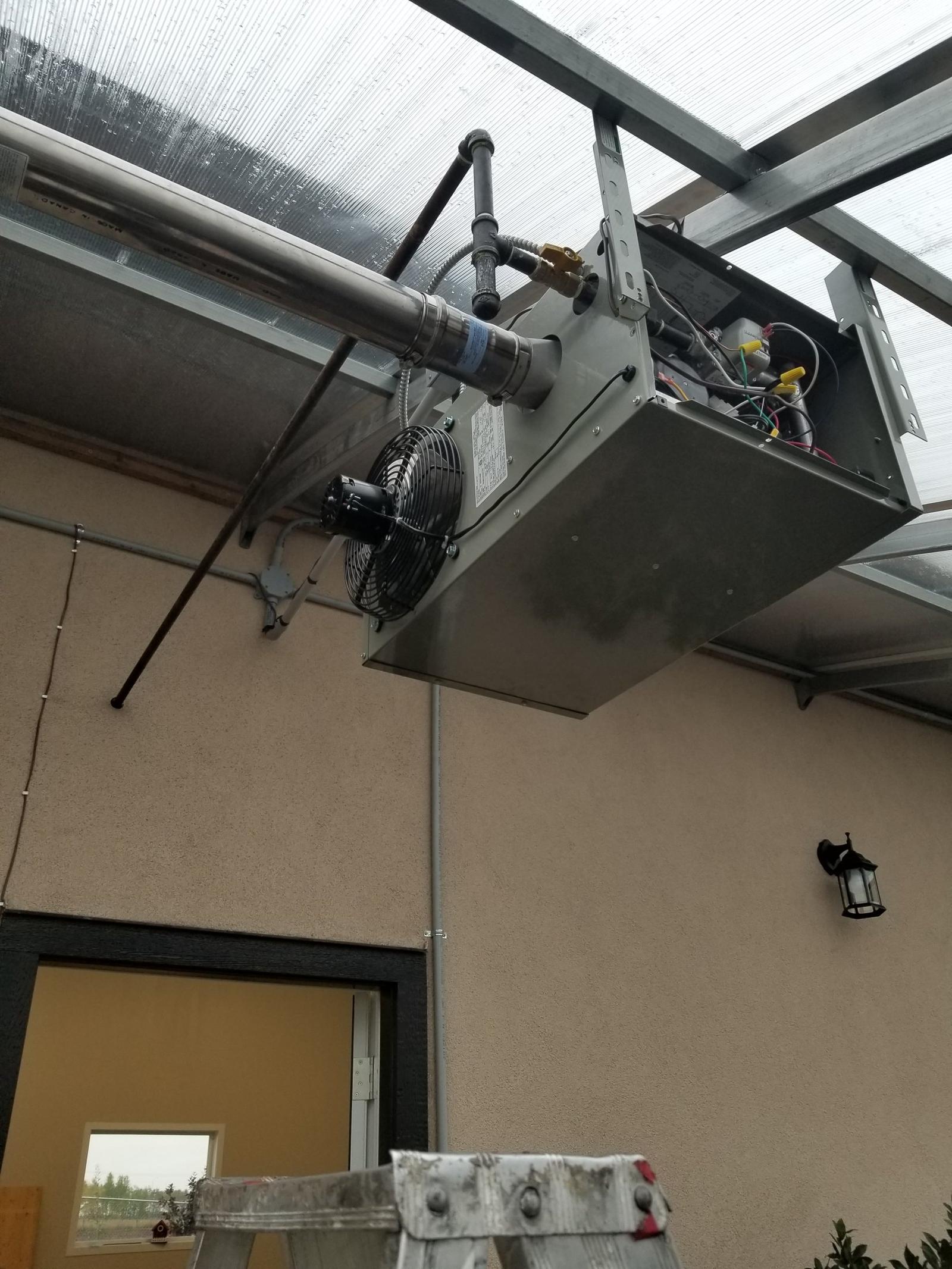 Natural gas garage heater installed in a Calgary garage by DNB