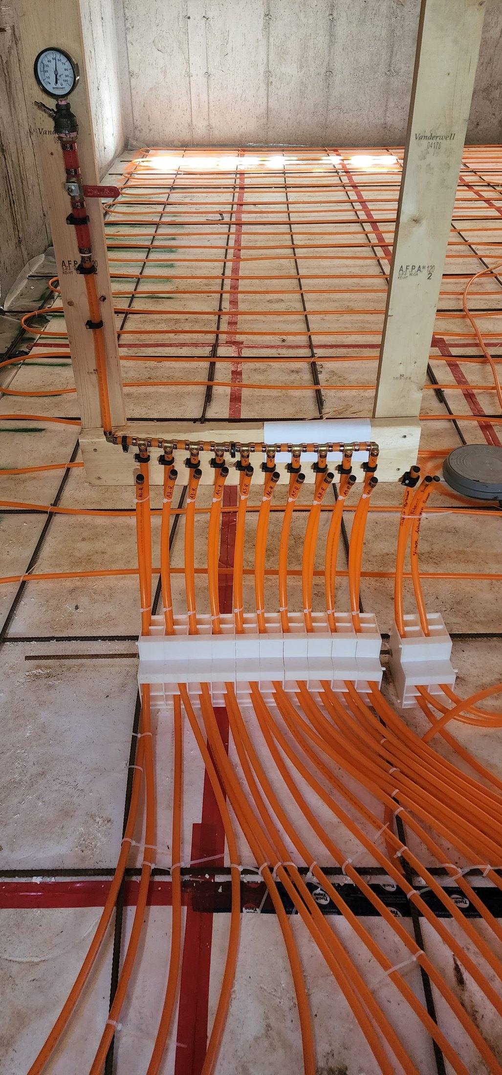 Calgary hydronic radiant floor manifold installed by DNB